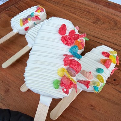 Fruity Pebble Cakesicles 🍇🍓🍒🍋🍏🫐