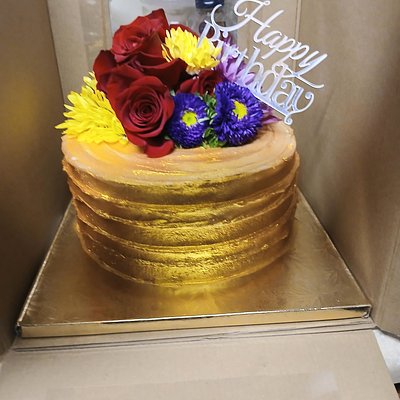 Gold Cake With Fresh Flowers