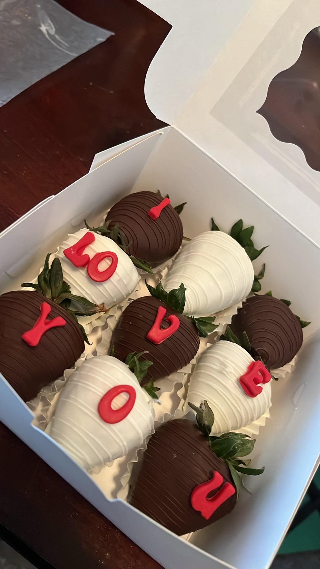 (9) chocolate covered strawberries.