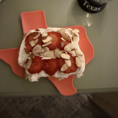 Tres Leches Topped W/ Strawberries & Almonds 