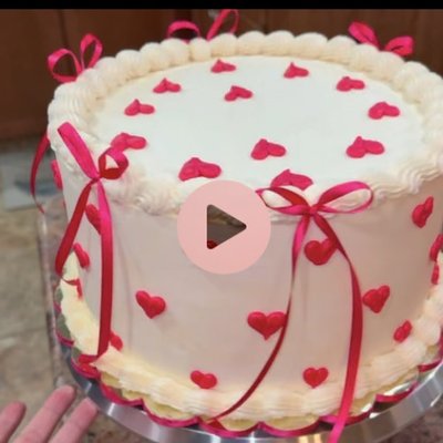 10 Inch Custom Four Layer Vanilla Cake With Moose And Heavy Detail