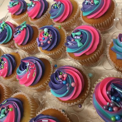 Sprinkled Or Color Iced Cupcakes 
