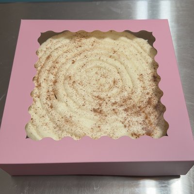 Cinnamon Roll Cheese Cake With Cream Cheese Frosting And Cinnamon Sprinkle 