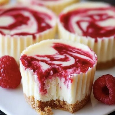 Raspberry Swirled Mini Cheesecakes