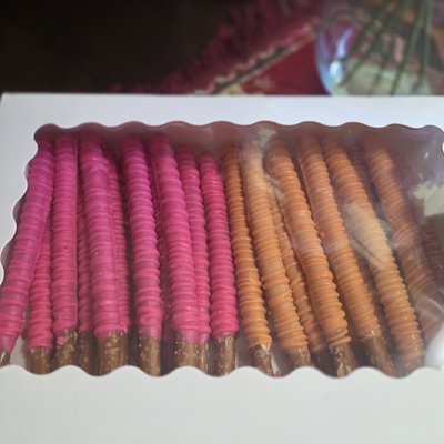 1 DOZEN CHOCOLATE DIPPED PRETZEL RODS