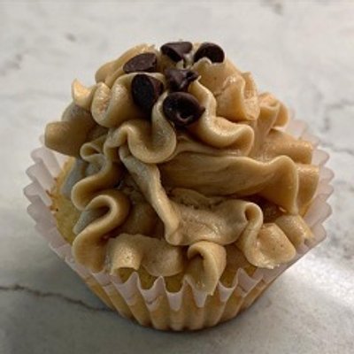 Half Baked- Cookie Dough cupcake filled with edible chocolate chip cookie dough & topped with a cookie butter frosting