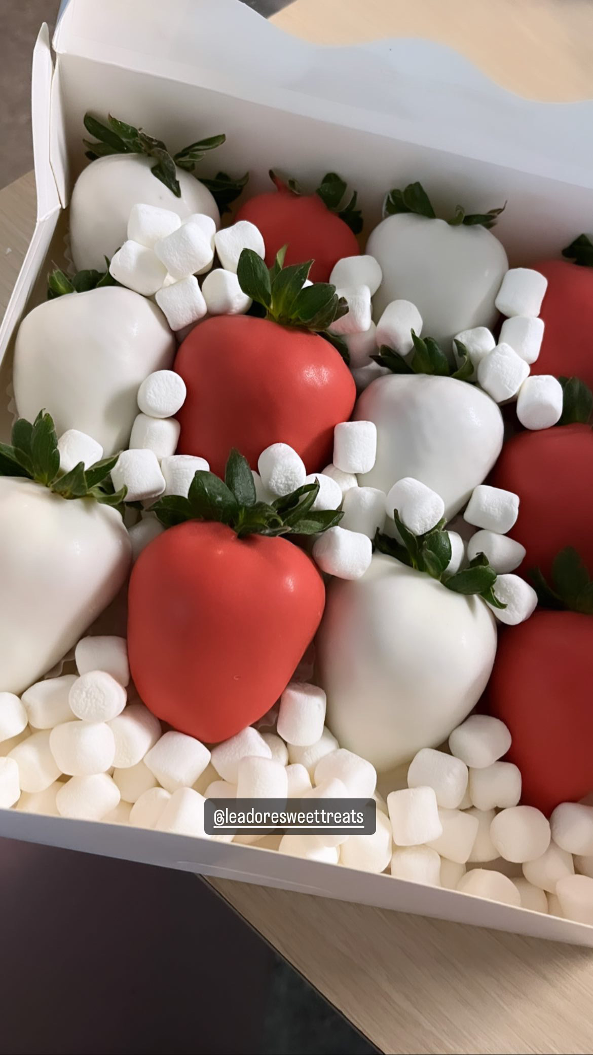 (12) chocolate covered strawberries.