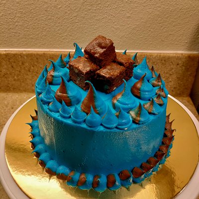 8in 2 Layer Brownie Cheesecake Cake With Blue Buttercream Frosting 