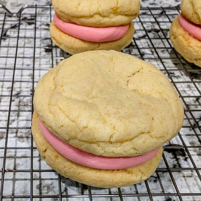 Lemon Sugar Cookie Sandwiches with Strawberry Frosting 