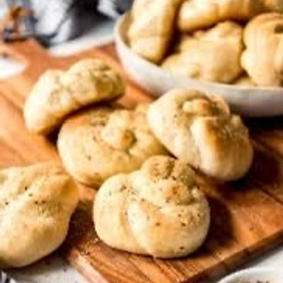 Garlic Knots $6 Per Half Dozen/ $10 Dozen