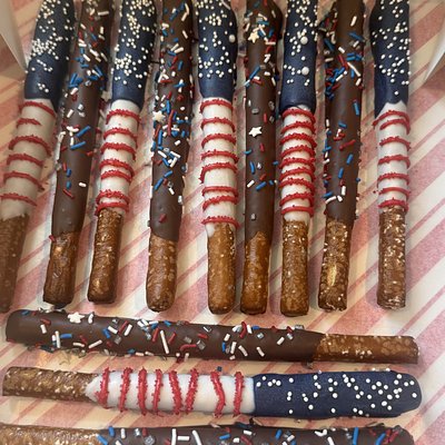 Chocolate dipped pretzel sticks By The Dozen