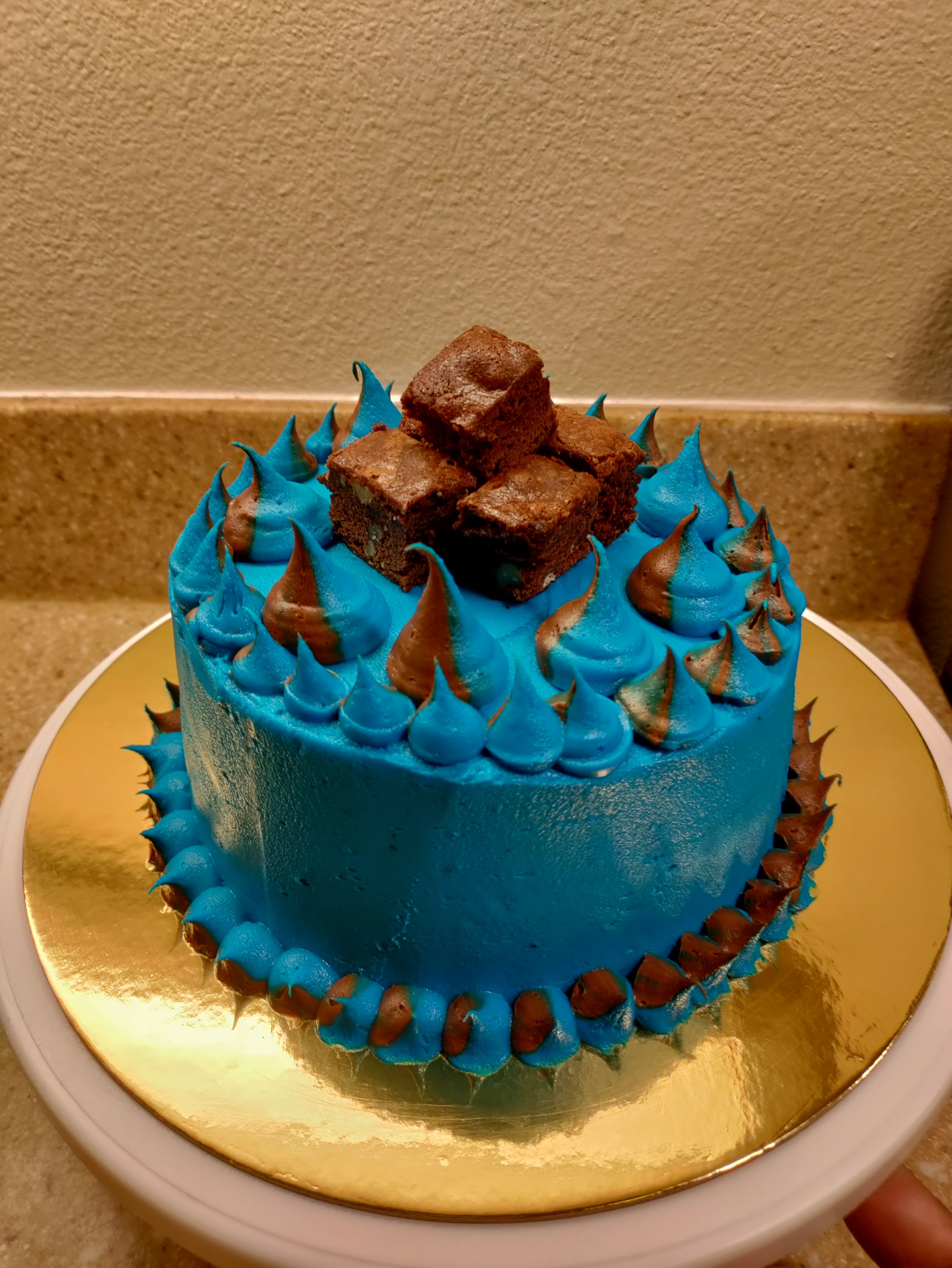 8in 2 Layer Brownie Cheesecake Cake With Blue Buttercream Frosting 