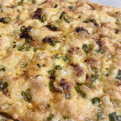 Focaccia - Sweet And Spicy Chili oil, Green onion, Shallots and Brie 