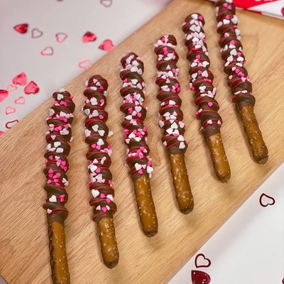Caramel Chocolate Dipped Pretzel Sticks - Dozen