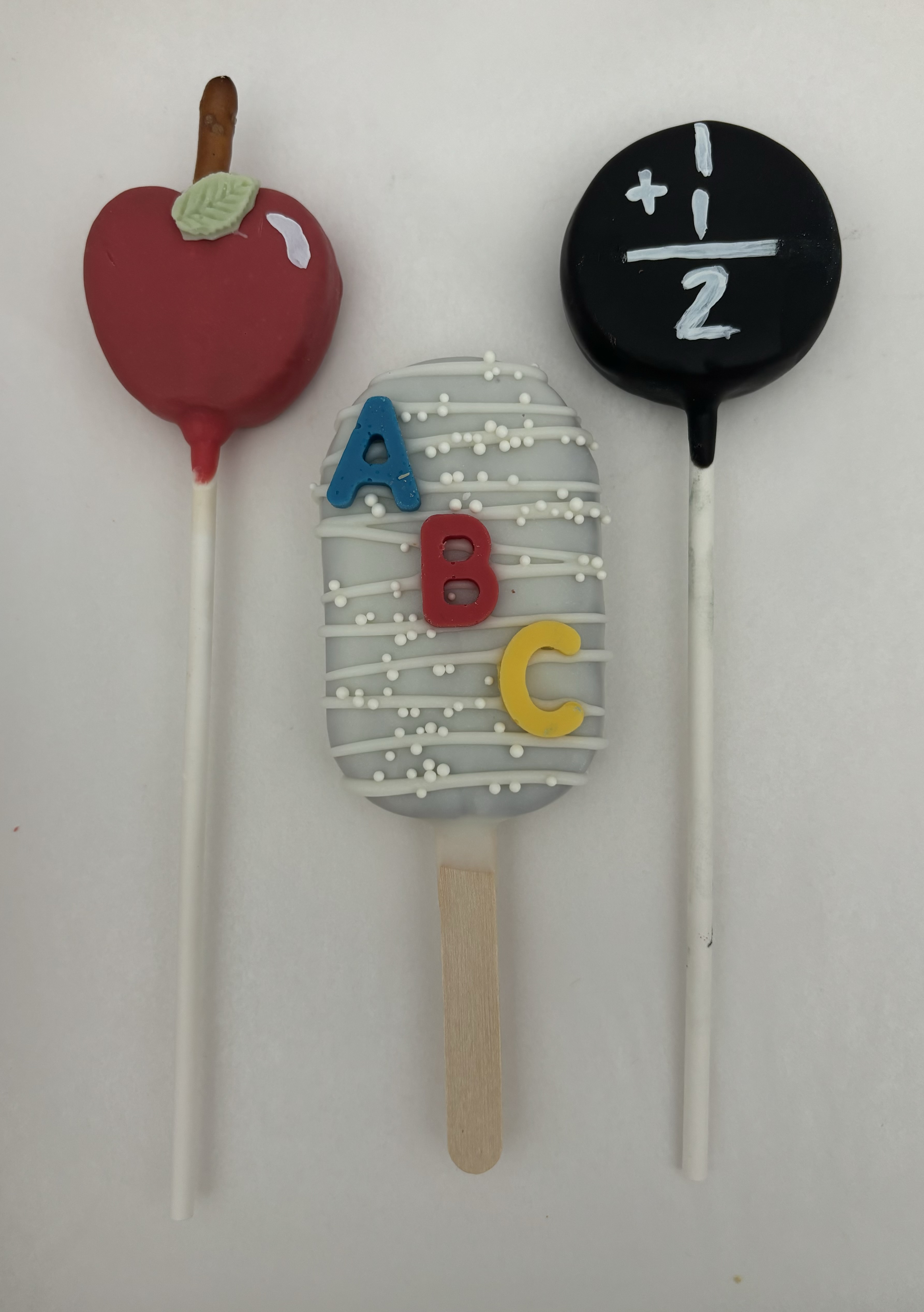 Two Cake Pops And One Cake Popsicle 