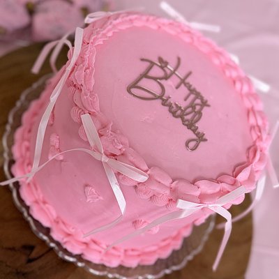 One 8” Two layer Cake W/ 12 Cupcakes 