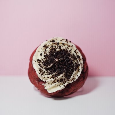 Red Velvet cream cheese topped with crushed Oreo