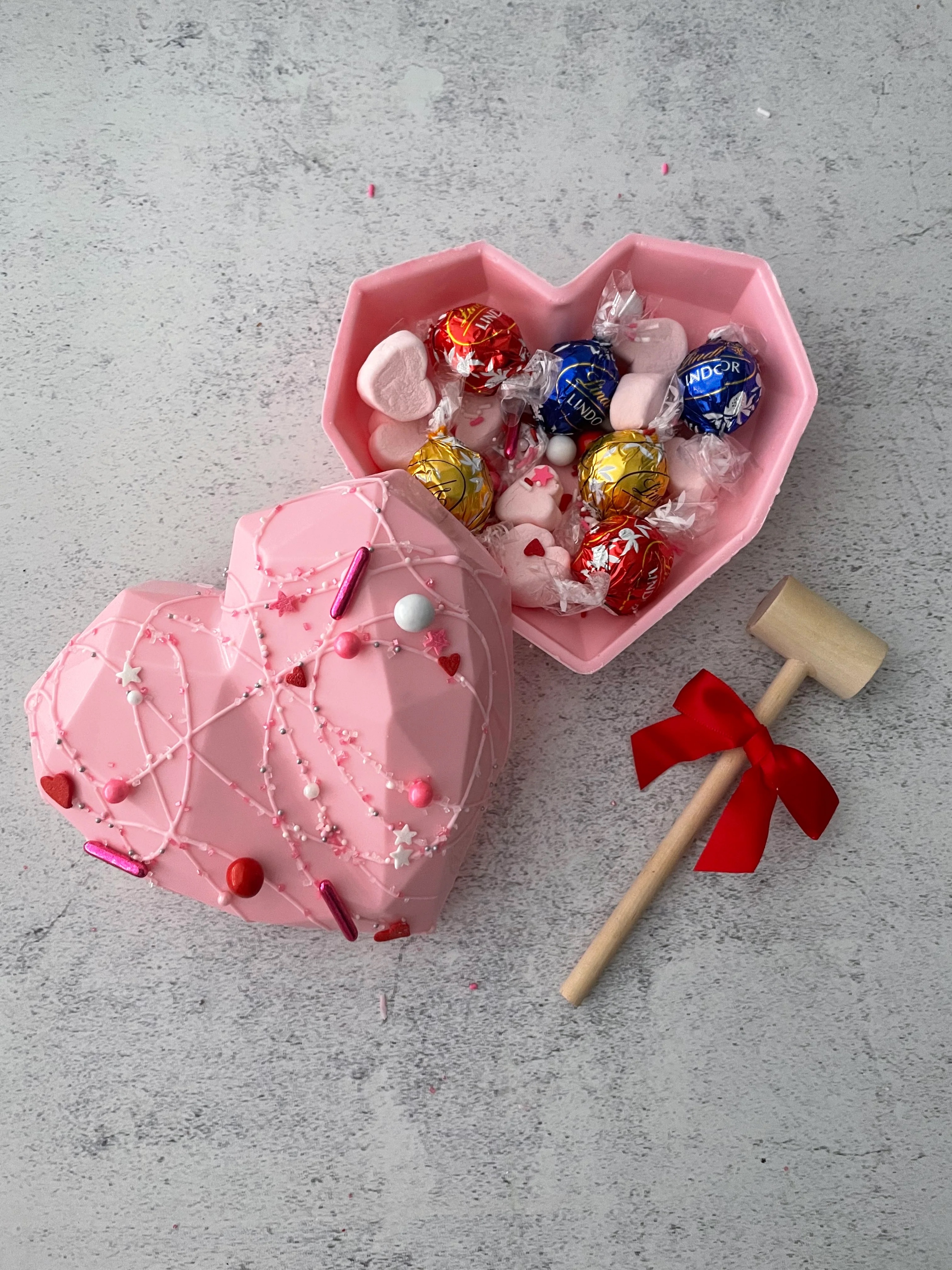 Breakable Heart Filled With Chocolates And Marshmallows 