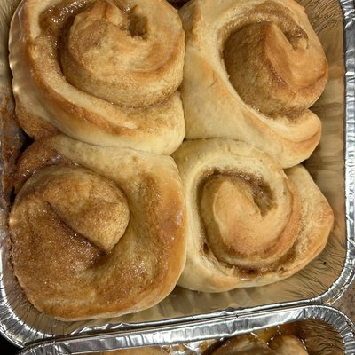 4 Jumbo Cinnamon Rolls With Icing On The Side  