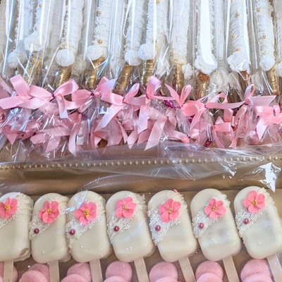 One Dozen Themed Colored And Decorated Cake Pops With 12 Count Matching Pretzel Sticks.
