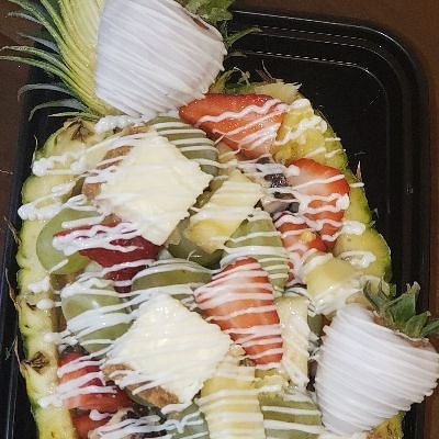 Individual Pineapple Boat (Pineapples, Strawberries, Grapes, 2 Chocolate Covered Strawberries, White Chocolate Drizzle)