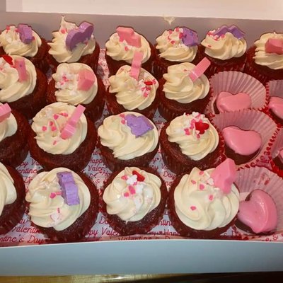 Red Velvet  Cupcakes With Cream Cheese Frosting Top With A Heart Or Edible Choc Lips 