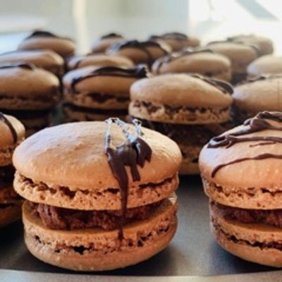 Chocolate Macarons with chocolate mouse filing. Total 6  