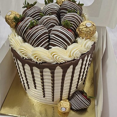 Chocolate Cake Supreme Topped With Dipped Berries 