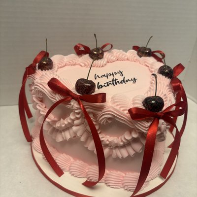 8 Inch Heart Cake . ( Pricing Increases With Design Complexity )