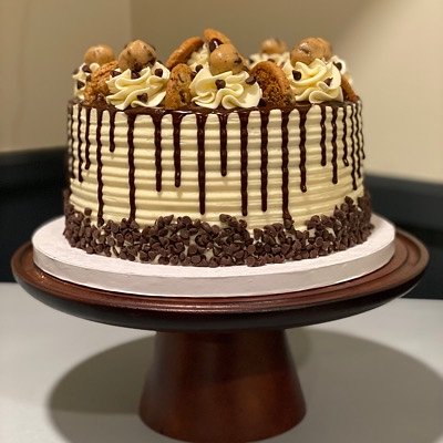 Signature Item- Cookie Dough Cake (Brown Butter Chocolate Chip Cake Layered With Vanilla Buttercream And Edible Cookie Dough Chunks. Topped With Vanilla Buttercream Dark Chocolate Ganache Drip,  Cookie Dough Chunks, And Chocolate Chip Cookies (Available In 6” Or 8”)