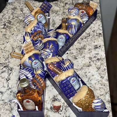 12 in Letters/Numbers Comes with 6-8 strawberries, 2-4 pretzels, 4-6 grapes,4-6 mini chocolate bars and flowers.  