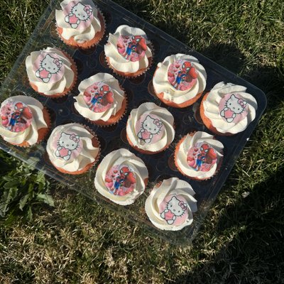 A Dozen Cupcakes With edible Toppers 