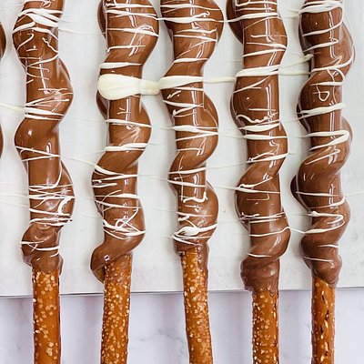 A Set Of 6 Caramel Pretzel Dipped In Chocolate 