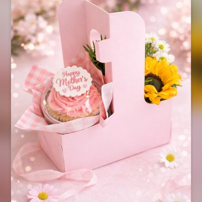 Single Cupcake And Flower Bouquet In A Drink Holder 