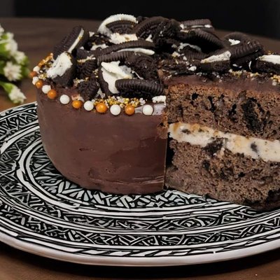 Double Chocolate Oreo Fudge Cake With Cookies And Cream Buttercream Topped With Chocolate Ganache 