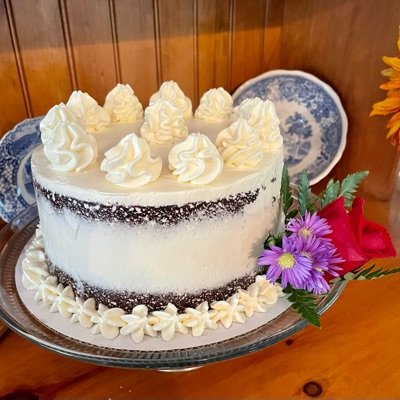 8” Chocolate Layer Cake With Flowers. Chocolate Cake With Mocha Filling, Swiss Buttercream Frosting
