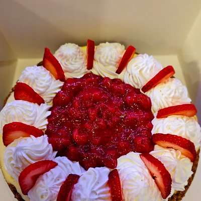 Vanilla Bean Cheesecake With Strawberry  Topping