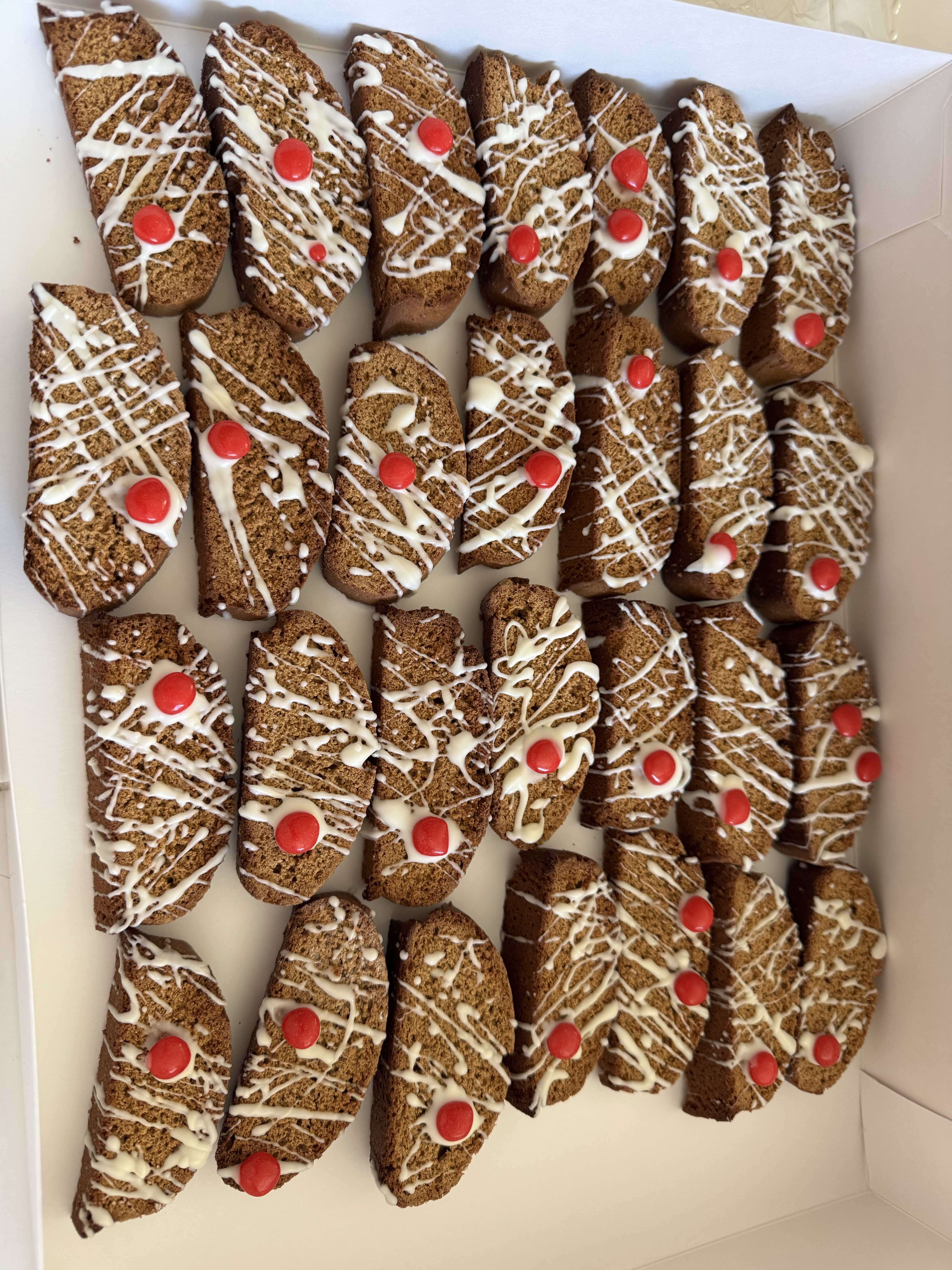 Gingerbread Biscotti With White Chocolate Drizzle Gingerbread biscotti with white chocolate drizzle