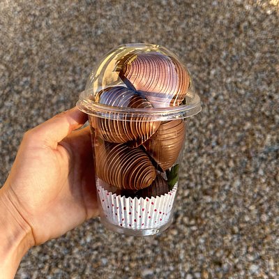 milk chocolate covered strawberry cup