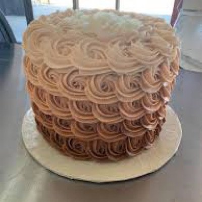 rosett 8” (3) layers cake with classic american buttercream feeds 15-20 guess