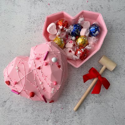 Breakable Heart Filled With Chocolates And Marshmallows 