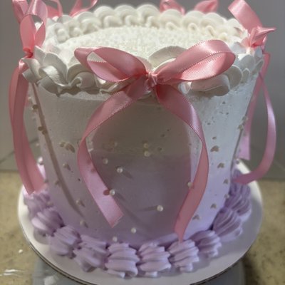 White And Purple Ombré 6” Cake With Bows And Pearls 