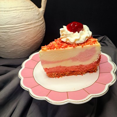 Strawberry Crunch Swirl Cheesecake Slice