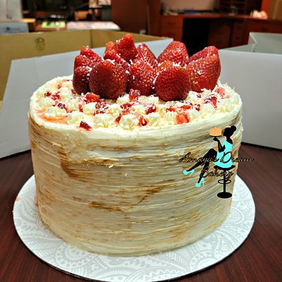 Vanilla Cake Topped With Strawberry Pieces