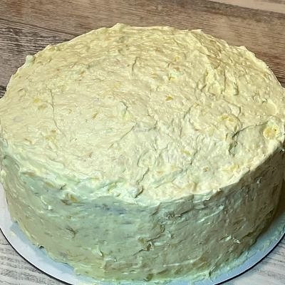 Pig Lickin' Cake - yellow cake infused with mandarin oranges, vanilla and crushed pineapple whipped icing-Serves 14-20