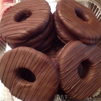 Chocolate Covered Pineapple Slices $18/dz; Strawberry Crunch Pineapple Slices ( $25)