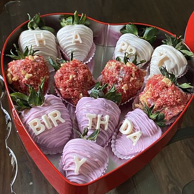 dozen chocolate covered strawberries .