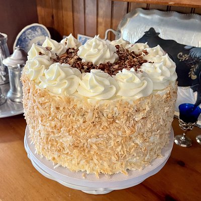Italian Cream Cake, Two 8” Layers With Cream Cheese Frosting , Toasted Coconut And Toasted Pecans