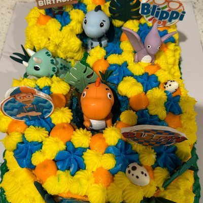 Blippi Dinosaur Adventure Cake
