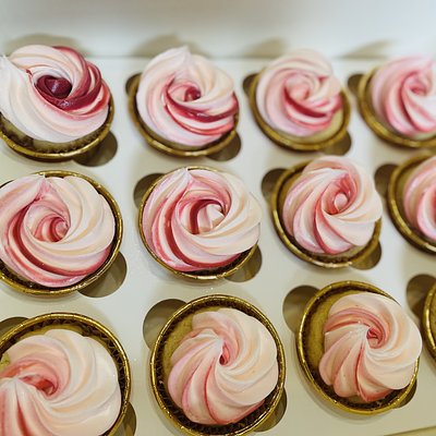 Dozen buttercream based cupcakes
